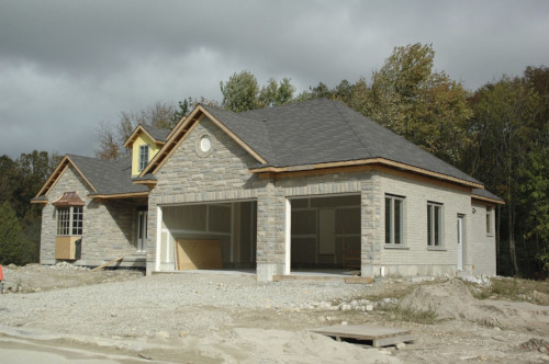 Exterior image of a house being built by ICON Restoration and Construction.